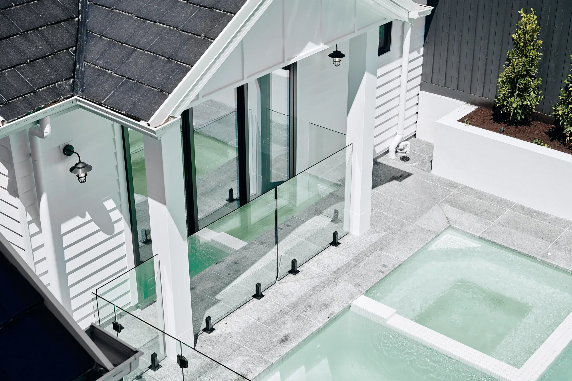 Aerial view of a pool and outdoor living area