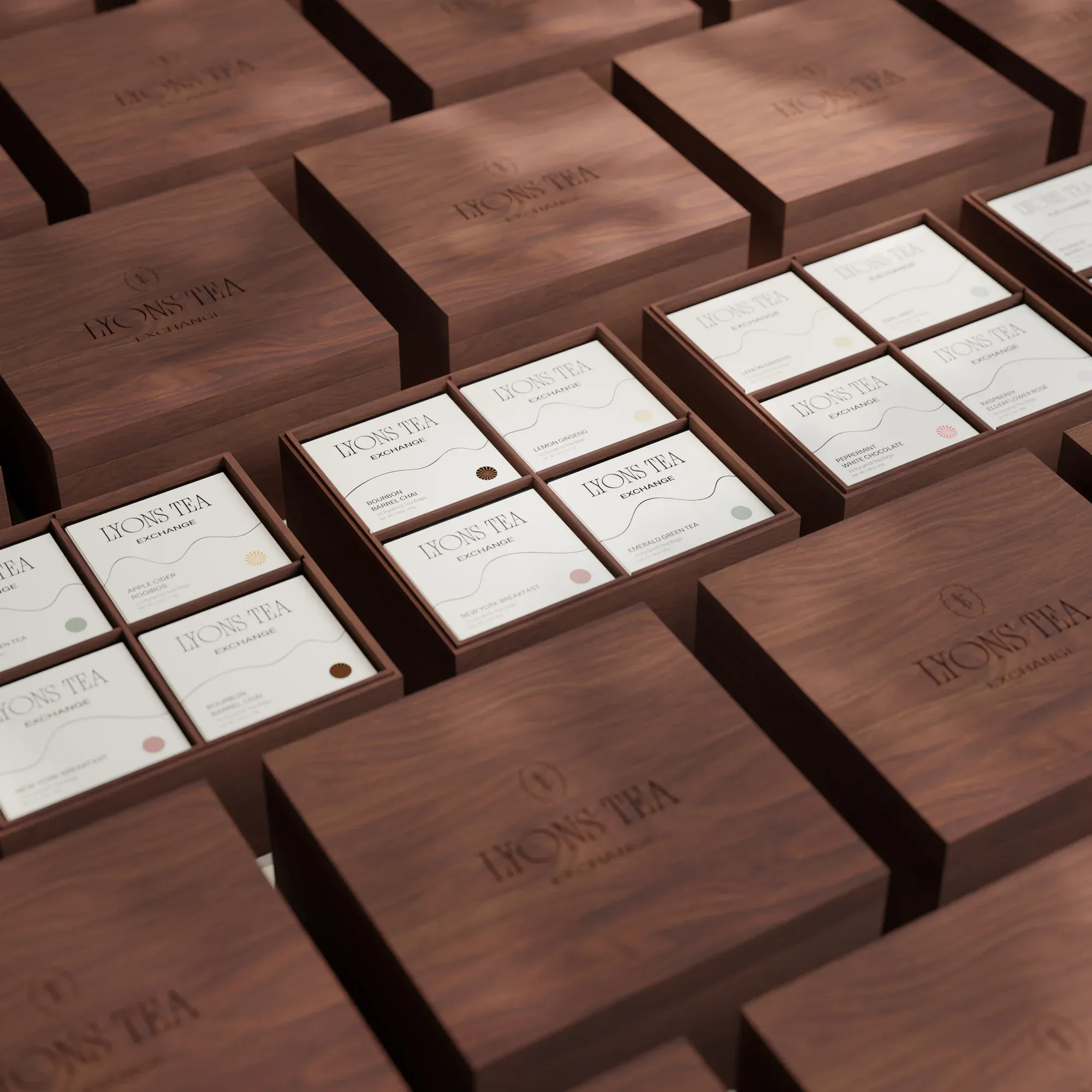Lyons Tea Exchange boxes arranged on a timber surface